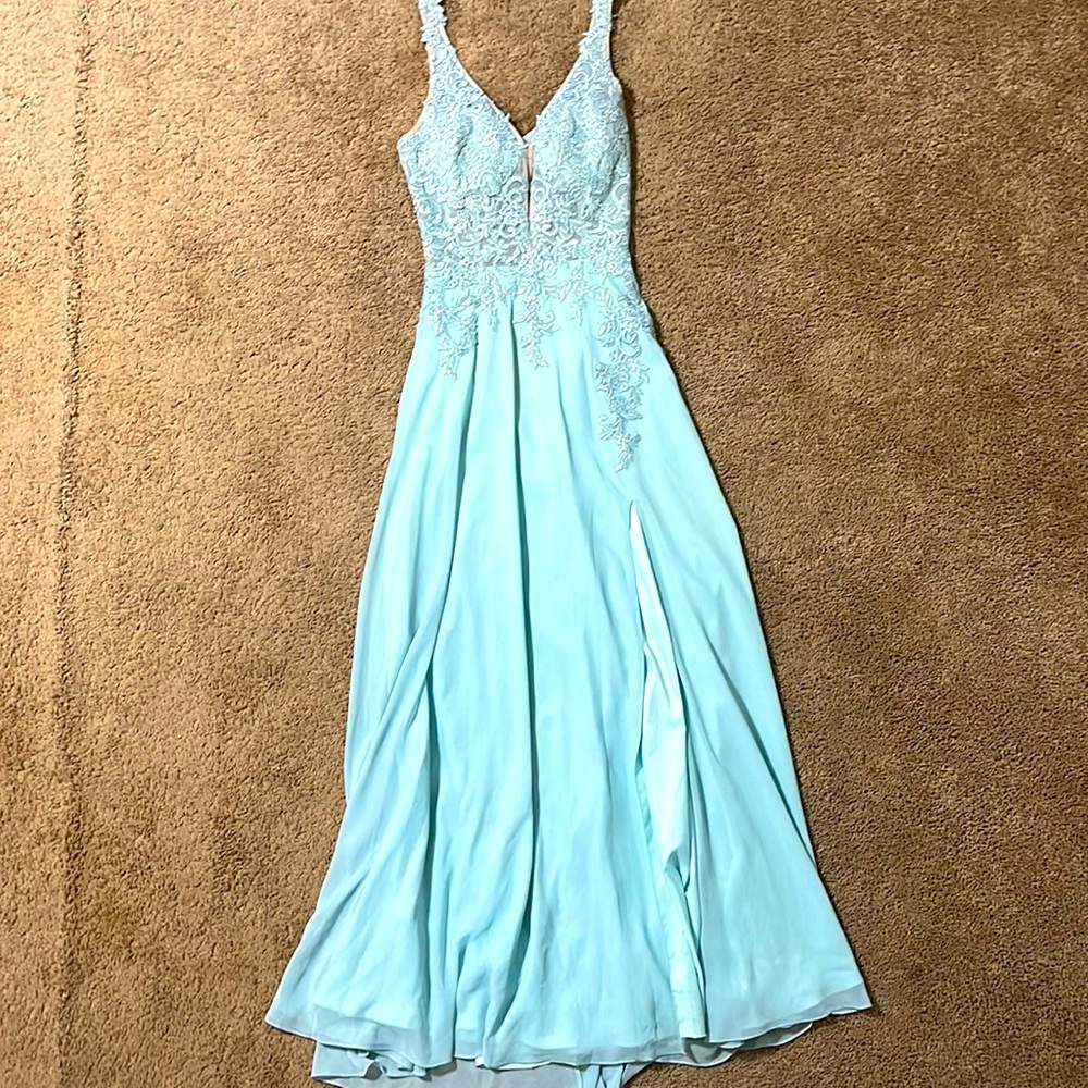 Used one time. Teal color. Size 11